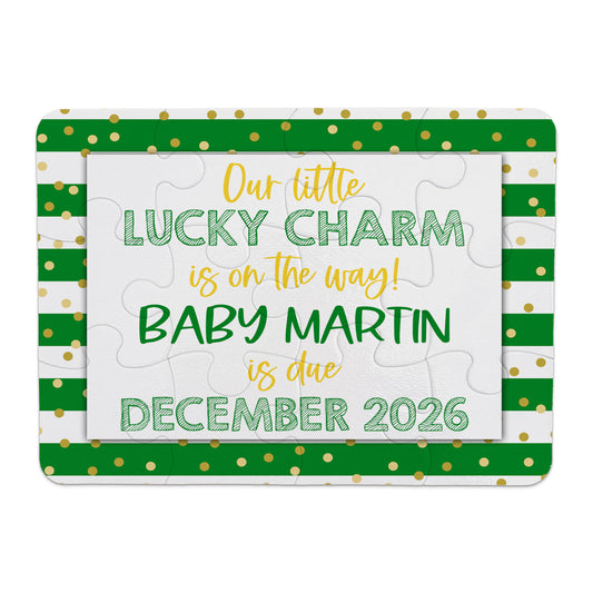 St. Patrick’s Day pregnancy announcement puzzle with green stripes and gold polka dots, reading “Our little lucky charm is on the way! Baby Martin is due December 2026”