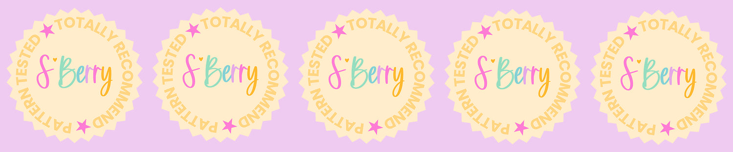 Five identical pastel badges with the text "S'Berry" in colorful script and "Totally Recommend, Pattern Tested" around the edge, on a light purple background.