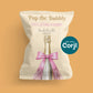 Champagne bottle bachelorette chip bag mockup with pink bow, “Pop the Bubbly” party favor template editable in Corjl