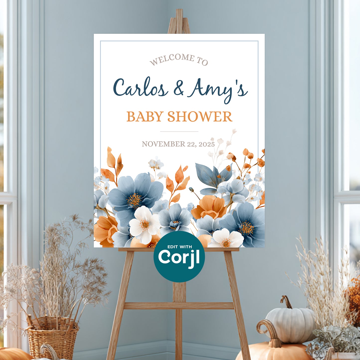Baby shower welcome sign on easel with blue and orange floral design, printable event sign decor template